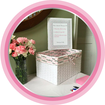 A box of practical essentials, including nappy cream, can be a perfect gift for new parents